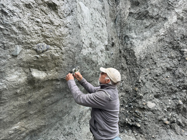 Tim measuring at Martyr River